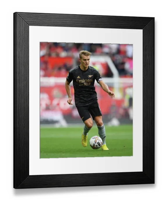 Framed Print : Arsenal's Martin Odegaard Faces Off Against Manchester United in Intense 2022-23 Premier League Showdown Framed Print : Arsenal's Martin Odegaard Faces Off Against Manchester United in Intense 2022-23 Premier League Showdown
