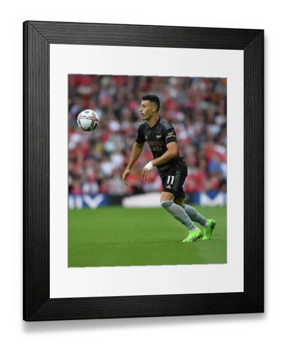 Framed Print : Arsenal's Gabriel Martinelli Faces Off Against Manchester United at Old Trafford (2022-23 Premier League) Framed Print : Arsenal's Gabriel Martinelli Faces Off Against Manchester United at Old Trafford (2022-23 Premier League)