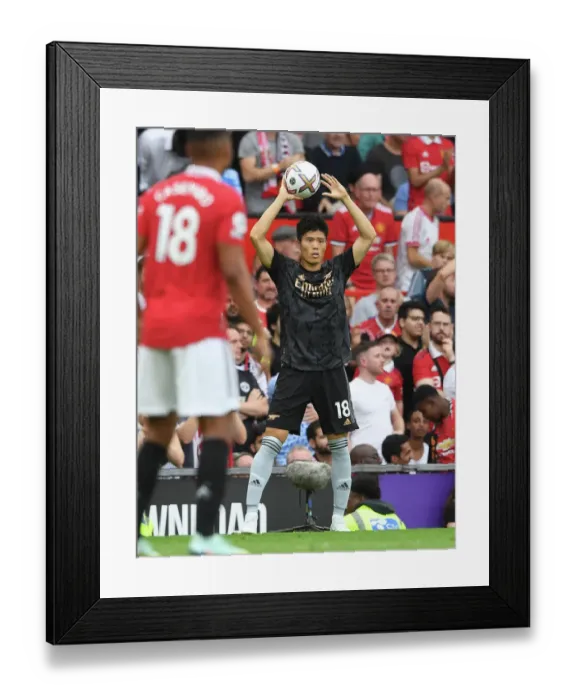 Framed Print : Arsenal's Tomiyasu Faces Off Against Manchester United in 2022-23 Premier League Clash Framed Print : Arsenal's Tomiyasu Faces Off Against Manchester United in 2022-23 Premier League Clash