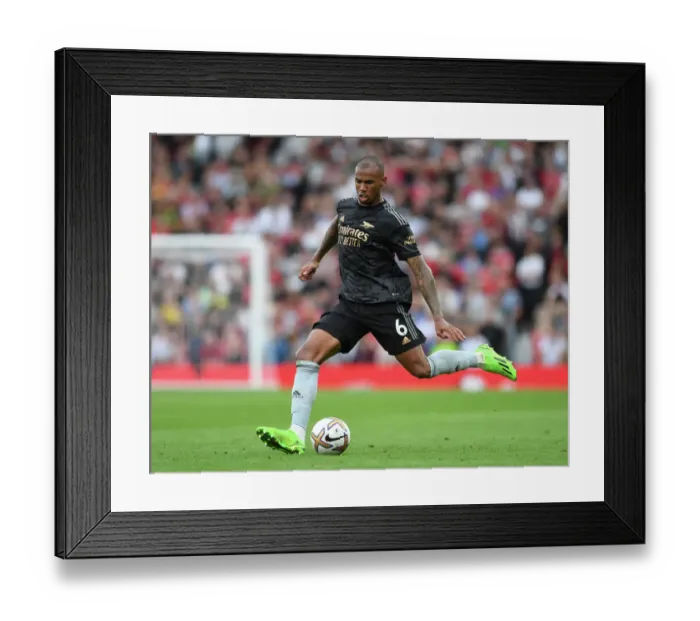 Framed Print : Arsenal's Gabriel Magalhaes Faces Off Against Manchester United in 2022-23 Premier League Clash