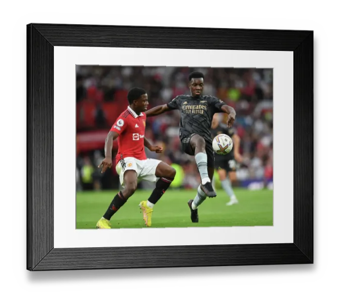 Framed Print : Nketiah vs Malacia: A Premier League Showdown at Old Trafford (2022-23)