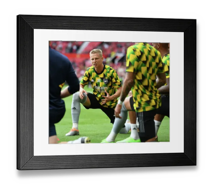 Framed Print : Arsenal's Zinchenko Warms Up Ahead of Manchester United Clash - Premier League 2022-23 Framed Print : Arsenal's Zinchenko Warms Up Ahead of Manchester United Clash - Premier League 2022-23