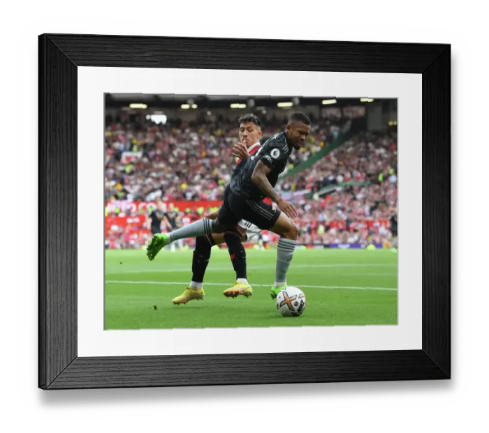 Framed Print : Gabriel Jesus vs Lisandro Martinez: Clash of the Titans - Manchester United vs Arsenal, Premier League 2022-23