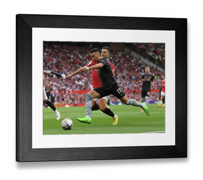 Framed Print : Young Stars Clash: Martinelli vs. Dalot - Manchester United vs. Arsenal (2022-23) Framed Print : Young Stars Clash: Martinelli vs. Dalot - Manchester United vs. Arsenal (2022-23)