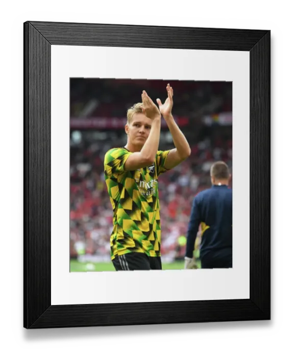 Framed Print : Martin Odegaard Readies for Arsenal's Showdown against Manchester United (2022-23 Premier League) Framed Print : Martin Odegaard Readies for Arsenal's Showdown against Manchester United (2022-23 Premier League)
