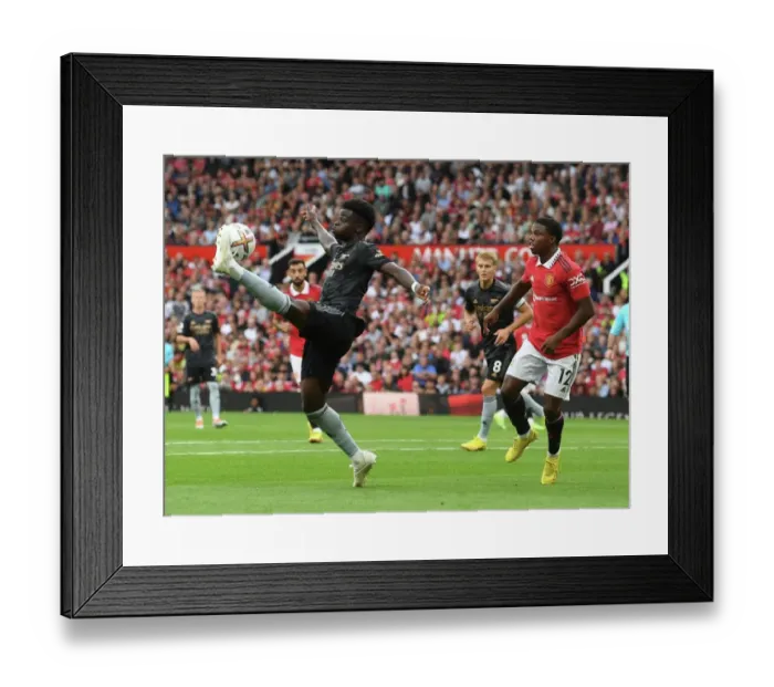 Framed Print : Saka vs Malacia: A Premier League Battle at Old Trafford - Manchester United vs Arsenal FC, 2022-23 Framed Print : Saka vs Malacia: A Premier League Battle at Old Trafford - Manchester United vs Arsenal FC, 2022-23