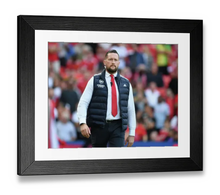 Framed Print : Arsenal's Security Braces for Manchester United Clash in Premier League (2022-23) Framed Print : Arsenal's Security Braces for Manchester United Clash in Premier League (2022-23)