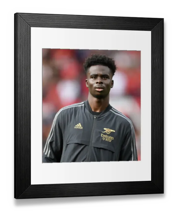 Framed Print : Bukayo Saka: Arsenal's Star Gear Up for Manchester United Showdown, Premier League 2022-23 Framed Print : Bukayo Saka: Arsenal's Star Gear Up for Manchester United Showdown, Premier League 2022-23