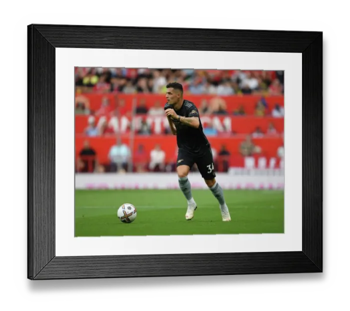 Framed Print : Xhaka at Old Trafford: Arsenal vs. Manchester United, Premier League 2022-23 Framed Print : Xhaka at Old Trafford: Arsenal vs. Manchester United, Premier League 2022-23