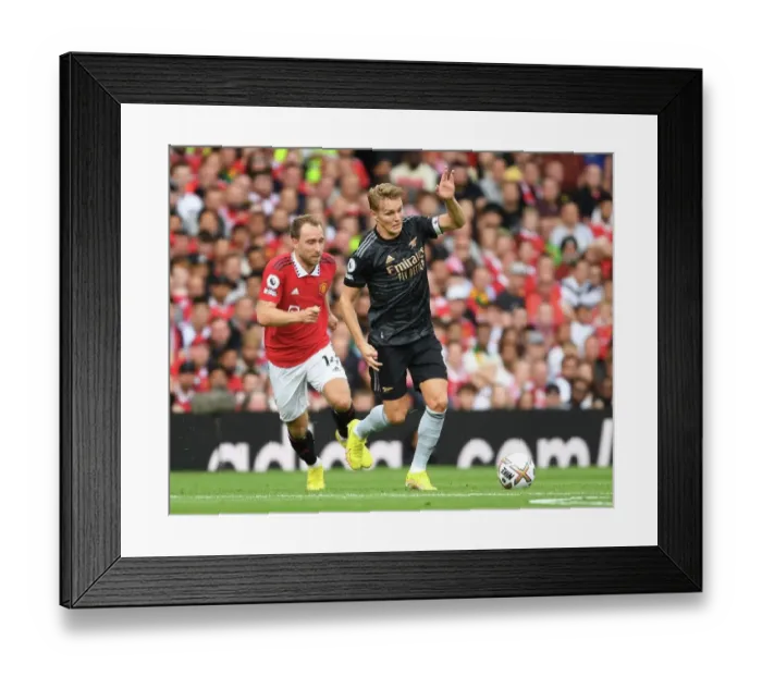 Framed Print : Odegaard Outshines Eriksen: Arsenal's Thrilling Victory Over Manchester United in the Premier League 2022-23 Framed Print : Odegaard Outshines Eriksen: Arsenal's Thrilling Victory Over Manchester United in the Premier League 2022-23