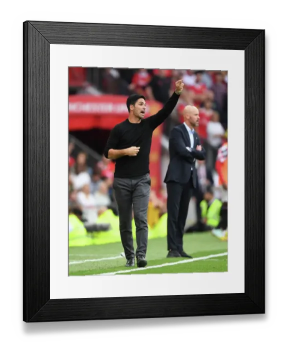 Framed Print : Clash of the Manchester Rivals: Arteta at Old Trafford - Manchester United vs. Arsenal FC, Premier League 2022-23