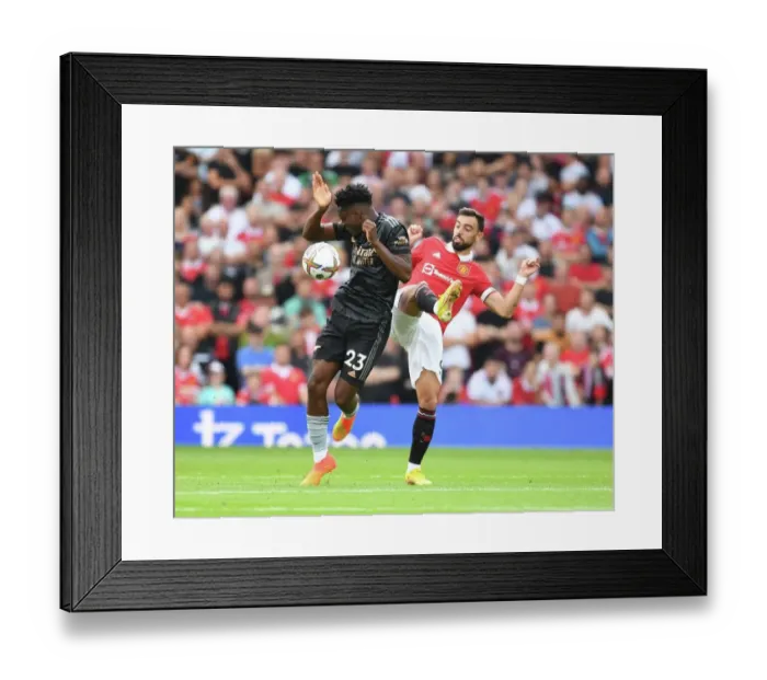 Framed Print : Manchester United vs. Arsenal: Fernandes vs. Sambi - The Premier League Showdown at Old Trafford (2022-23) Framed Print : Manchester United vs. Arsenal: Fernandes vs. Sambi - The Premier League Showdown at Old Trafford (2022-23)