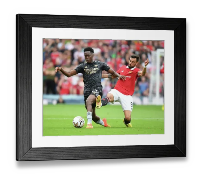 Framed Print : Sambi of Arsenal Evades Bruno Fernandes: Manchester United vs Arsenal FC, Premier League 2022-23