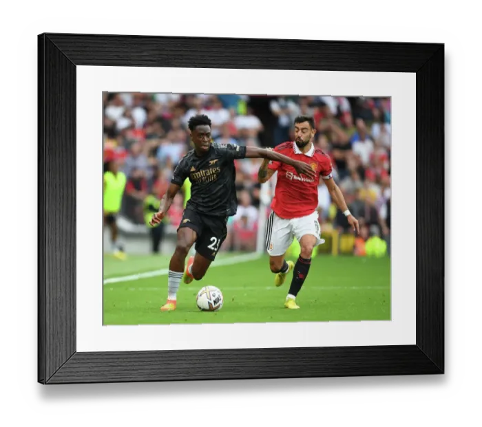 Framed Print : Sambi of Arsenal Breaks Past Bruno Fernandes: Manchester United vs. Arsenal FC, Premier League 2022-23