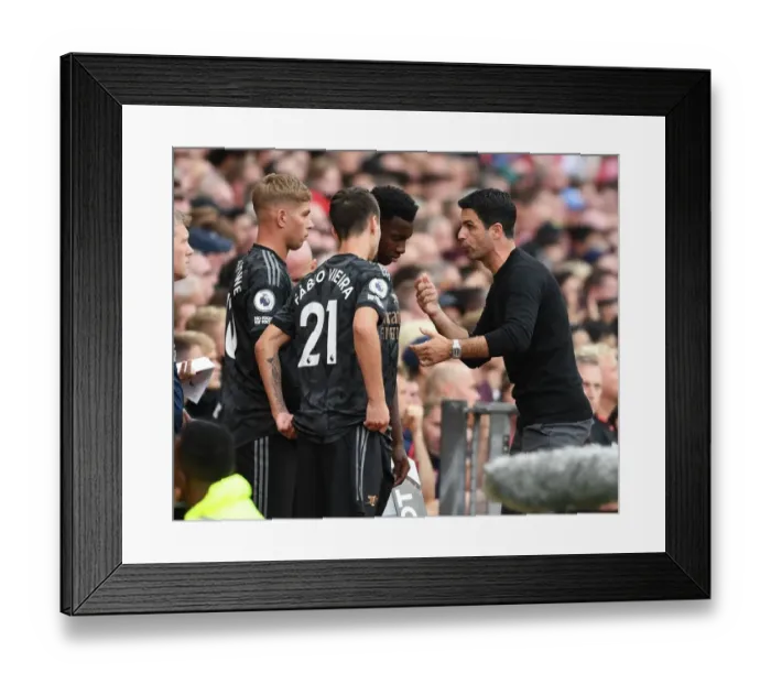 Framed Print : Arsenal Manager Mikel Arteta Conferring with Substitutes during Manchester United vs Arsenal (2022-23)