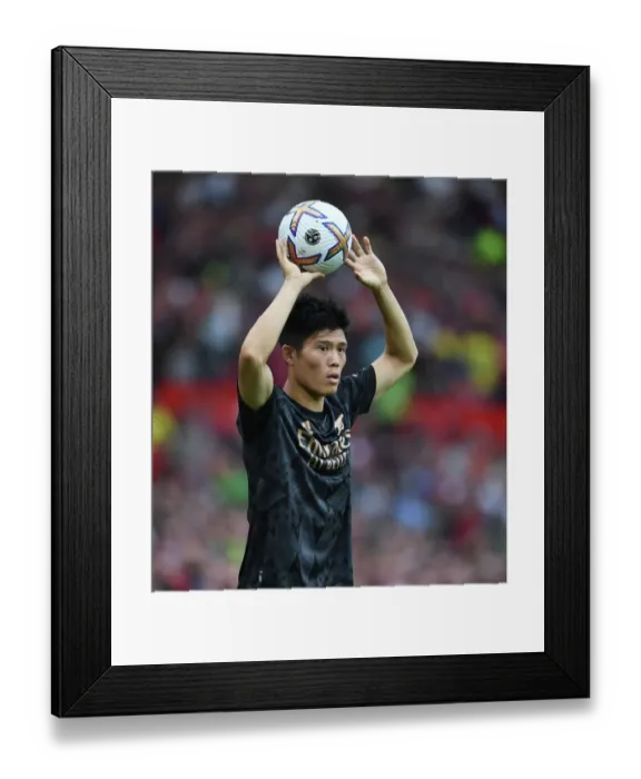 Framed Print : Arsenal's Tomiyasu Faces Manchester United in Premier League Showdown (2022-23)