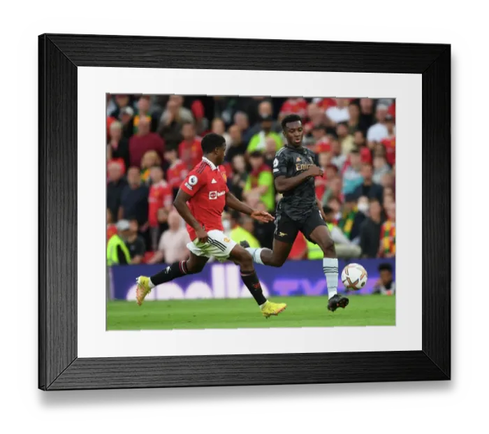 Framed Print : Young Stars Clash: Nketiah vs Malacia in Manchester United vs Arsenal Premier League Showdown (2022-23)