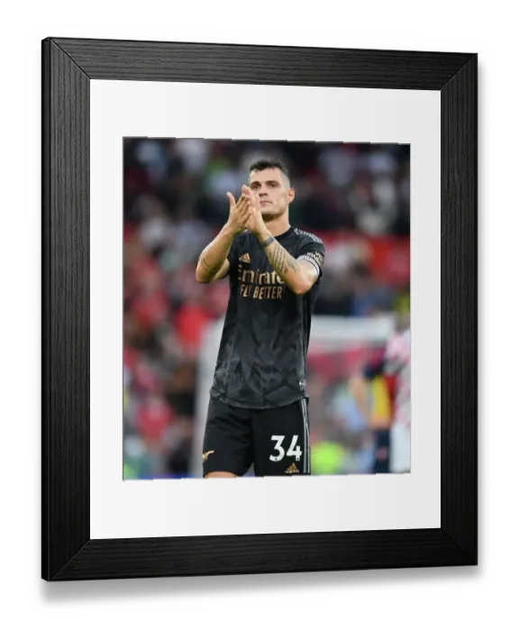 Framed Print : Xhaka Salutes Arsenal Fans: Manchester United vs Arsenal FC - Premier League 2022-23 Framed Print : Xhaka Salutes Arsenal Fans: Manchester United vs Arsenal FC - Premier League 2022-23