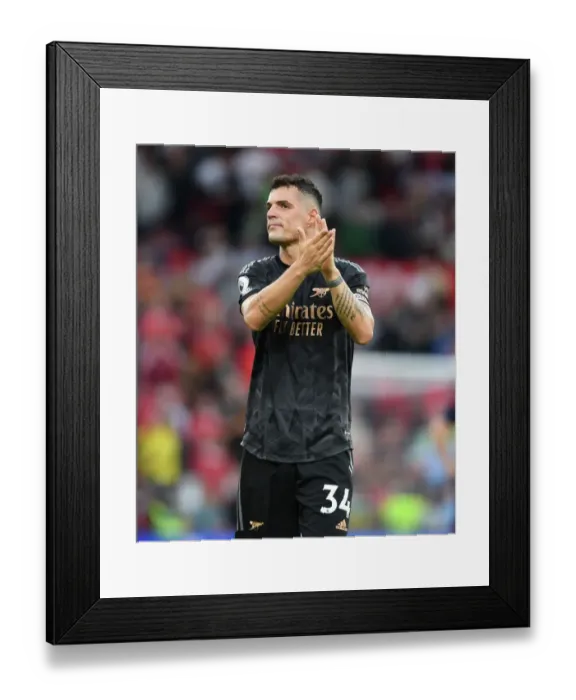 Framed Print : Xhaka Applauds Arsenal Fans: Manchester United vs Arsenal FC, Premier League 2022-23 Framed Print : Xhaka Applauds Arsenal Fans: Manchester United vs Arsenal FC, Premier League 2022-23