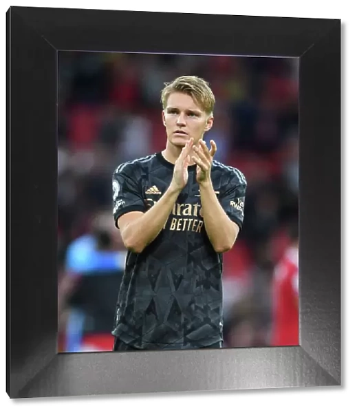 Arsenal's Martin Odegaard Celebrates with Fans after Manchester United Victory - Premier League 2022-23