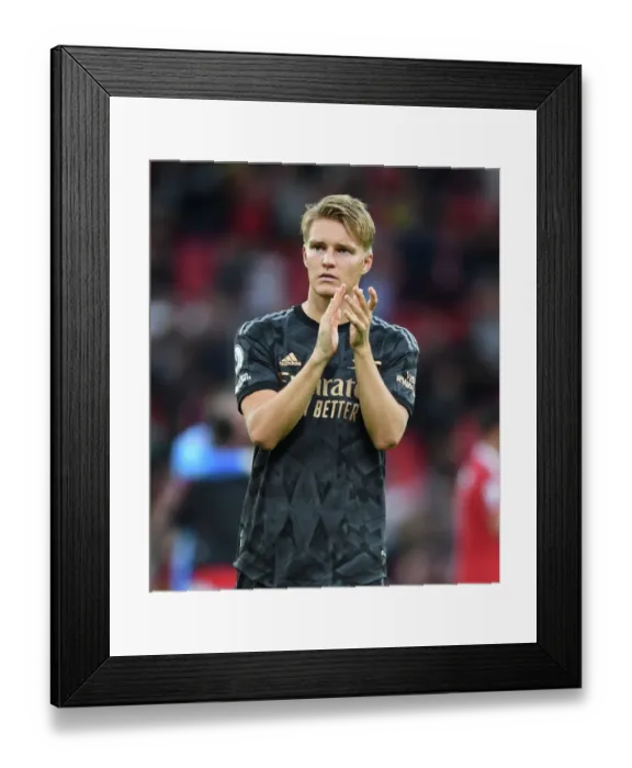Framed Print : Arsenal's Martin Odegaard Celebrates with Fans after Manchester United Victory - Premier League 2022-23