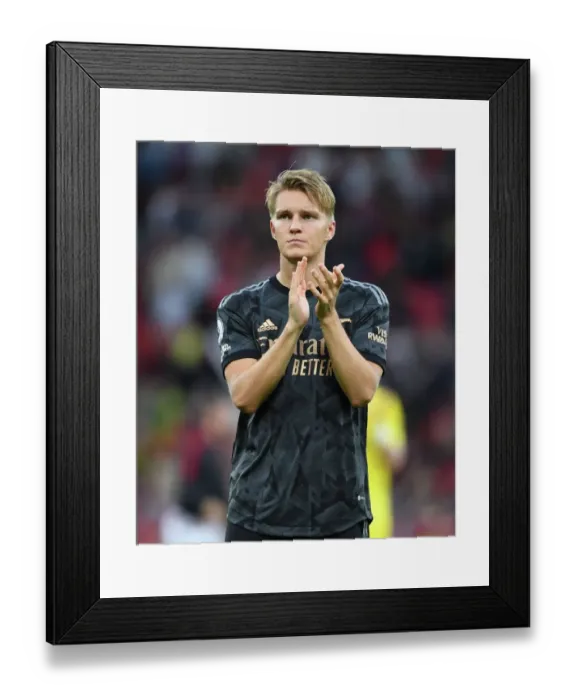 Framed Print : Martin Odegaard's Triumphant Celebration: Arsenal Fans Go Wild After Manchester United Defeat, Premier League 2022-23
