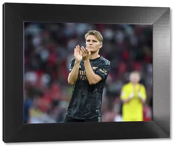 Arsenal's Martin Odegaard Applauding Fans after Manchester United Clash - Premier League 2022-23