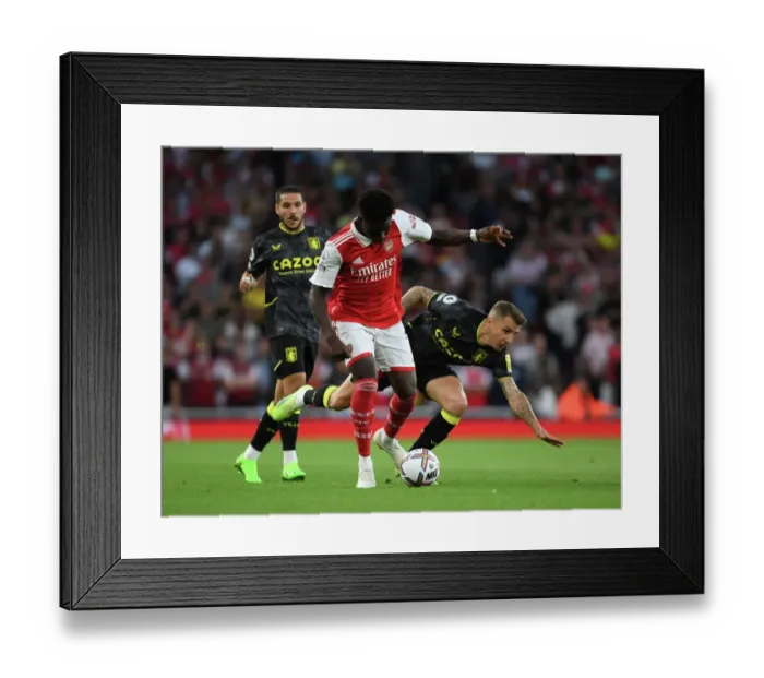 Framed Print : Saka Slices Through Digne: Thrilling Moment from Arsenal's Victory over Aston Villa Framed Print : Saka Slices Through Digne: Thrilling Moment from Arsenal's Victory over Aston Villa