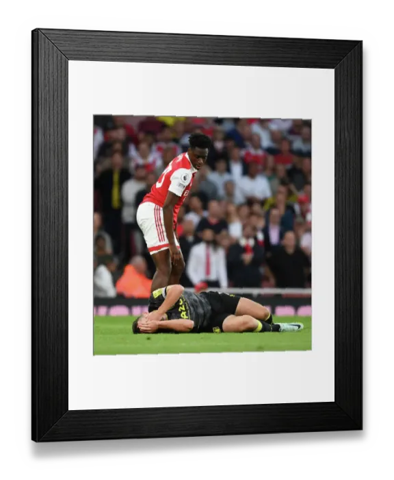 Framed Print : Arsenal's Sambi Stands Firm Against Aston Villa's McGinn in Intense Premier League Clash (2022-23) Framed Print : Arsenal's Sambi Stands Firm Against Aston Villa's McGinn in Intense Premier League Clash (2022-23)