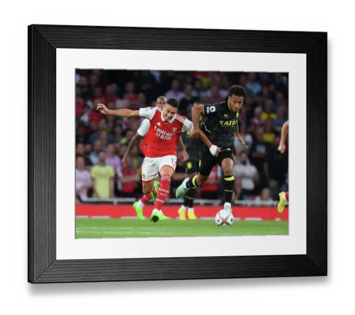 Framed Print : Arsenal vs Aston Villa: Martinelli Clashes with Kanas in Premier League Showdown (2022-23) Framed Print : Arsenal vs Aston Villa: Martinelli Clashes with Kanas in Premier League Showdown (2022-23)
