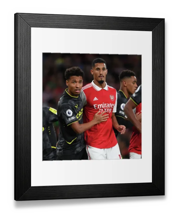 Framed Print : Arsenal vs Aston Villa: Saliba Marks Kamara in Premier League Clash (2022-23)