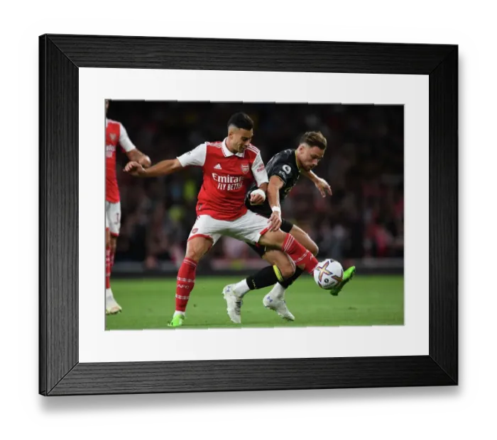 Framed Print : Arsenal's Martinelli Clashes with Aston Villa's Cash in 2022-23 Premier League Showdown Framed Print : Arsenal's Martinelli Clashes with Aston Villa's Cash in 2022-23 Premier League Showdown