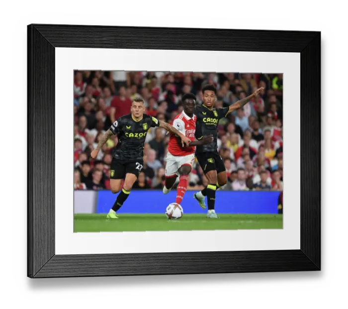 Framed Print : Arsenal's Bukayo Saka Faces Off Against Aston Villa's Lucas Digne and Boubacar Bernard Kamara in 2022-23 Premier League Clash Framed Print : Arsenal's Bukayo Saka Faces Off Against Aston Villa's Lucas Digne and Boubacar Bernard Kamara in 2022-23 Premier League Clash