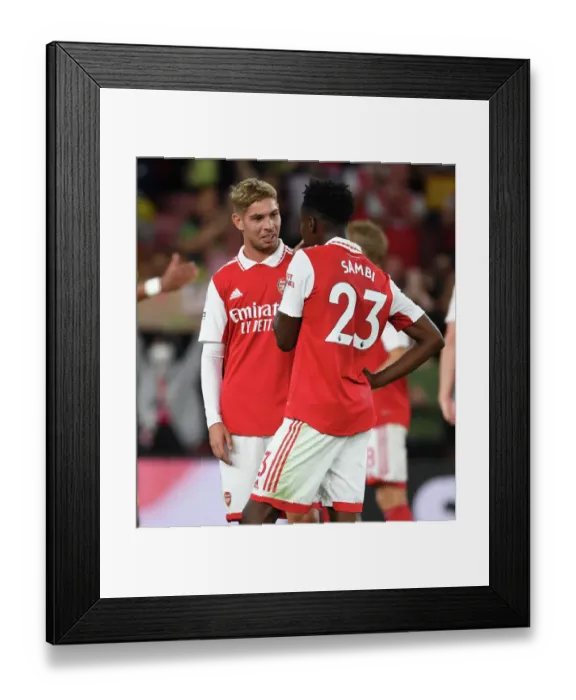 Framed Print : Arsenal's Smith Rowe and Sambi Celebrate Victory Over Aston Villa in 2022-23 Premier League
