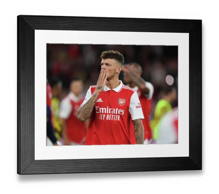 Framed Print : Arsenal's Ben White Embraces Family Moment after Arsenal v Aston Villa Match (2022-23)
