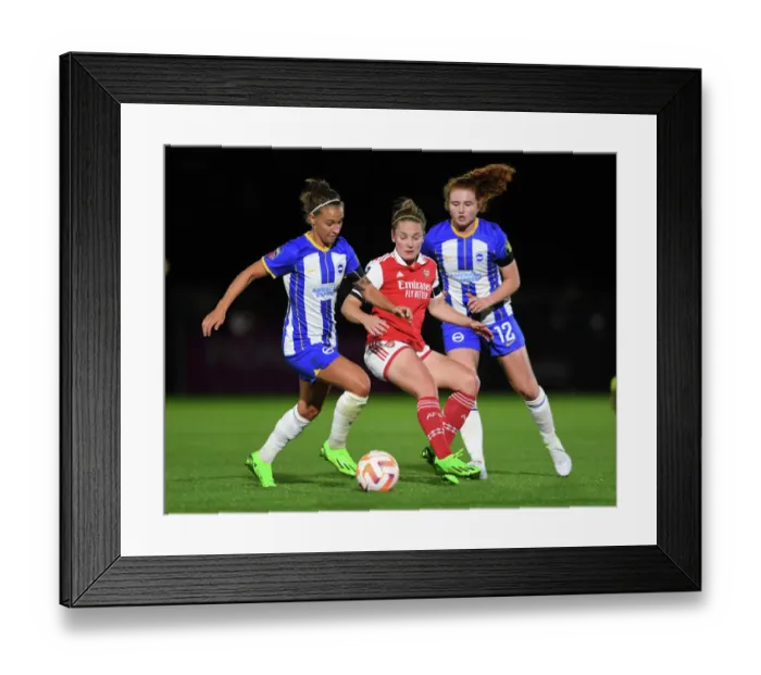 Framed Print : Arsenal's Kim Little Fights Past Defenders in Intense Barclays WSL Showdown Against Brighton Framed Print : Arsenal's Kim Little Fights Past Defenders in Intense Barclays WSL Showdown Against Brighton
