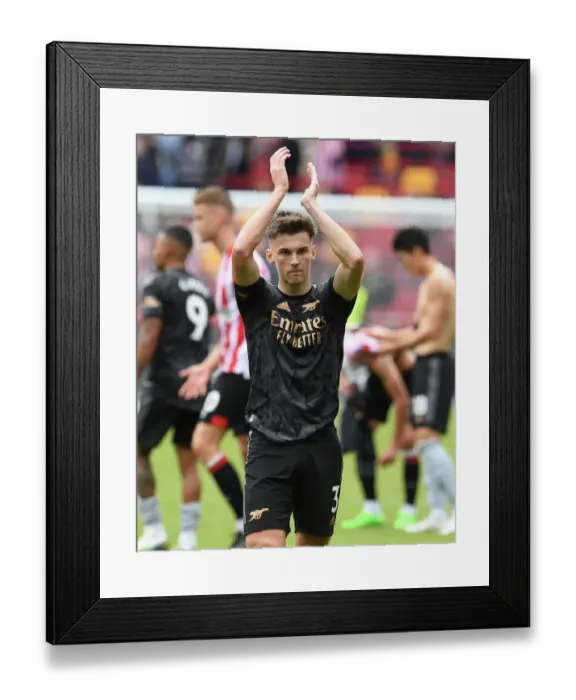 Framed Print : Arsenal's Kieran Tierney Celebrates Win Against Brentford in 2022-23 Premier League Framed Print : Arsenal's Kieran Tierney Celebrates Win Against Brentford in 2022-23 Premier League