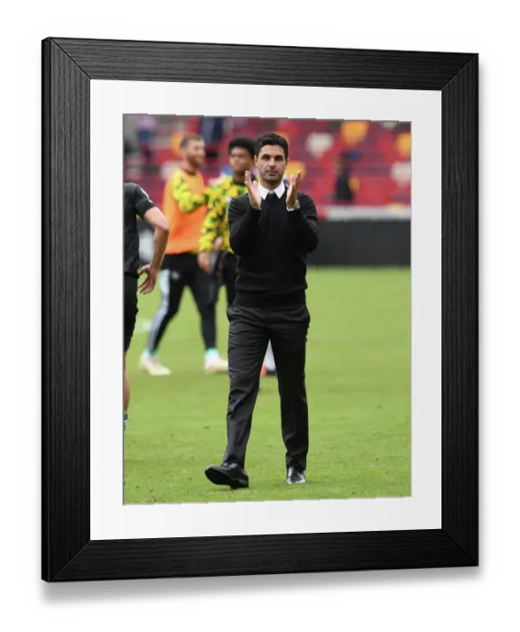 Framed Print : Mikel Arteta Celebrates with Arsenal Fans: Victory at Brentford in 2022-23 Premier League Framed Print : Mikel Arteta Celebrates with Arsenal Fans: Victory at Brentford in 2022-23 Premier League