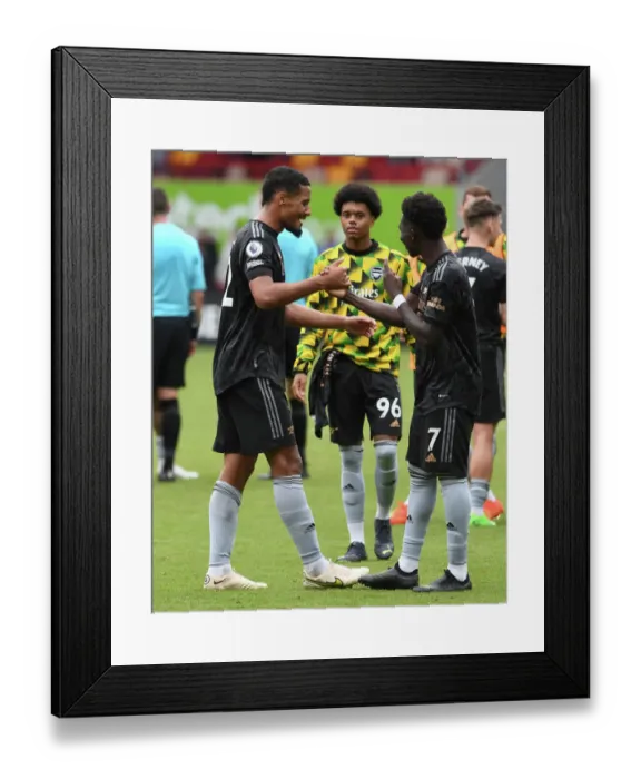 Framed Print : Arsenal's Saliba and Saka Celebrate Victory: Brentford FC vs Arsenal FC, Premier League 2022-23 Framed Print : Arsenal's Saliba and Saka Celebrate Victory: Brentford FC vs Arsenal FC, Premier League 2022-23