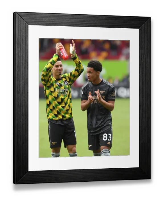 Framed Print : Arsenal Players Ethan Nwaneri and Gabriel Martinelli Celebrate with Fans after Brentford Victory, 2022-23 Premier League Framed Print : Arsenal Players Ethan Nwaneri and Gabriel Martinelli Celebrate with Fans after Brentford Victory, 2022-23 Premier League