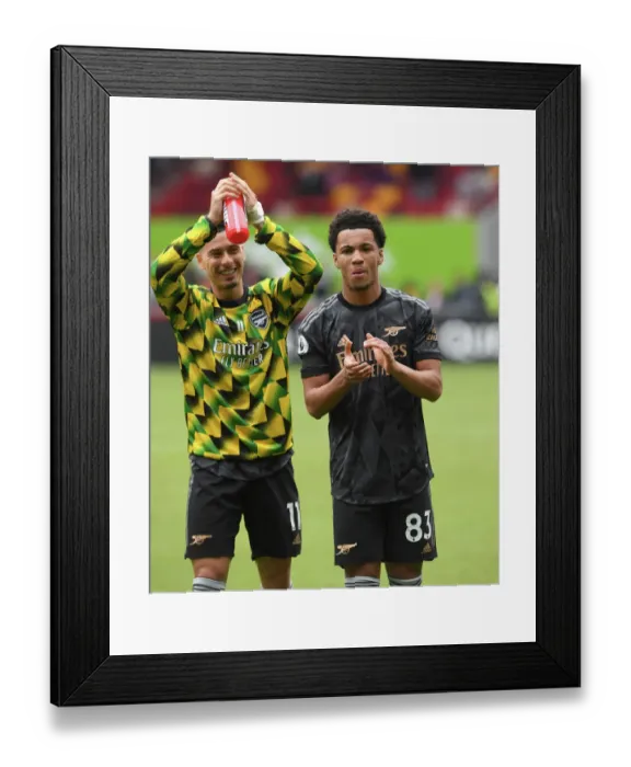 Framed Print : Arsenal's Ethan Nwaneri and Gabriel Martinelli Celebrate Victory with Fans at Brentford Community Stadium