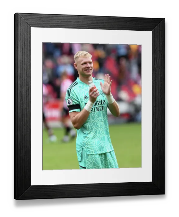 Framed Print : Arsenal's Aaron Ramsdale Celebrates with Fans after Brentford Victory Framed Print : Arsenal's Aaron Ramsdale Celebrates with Fans after Brentford Victory
