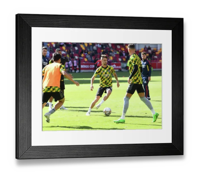 Framed Print : Fabio Vieira's Premier League Debut: Arsenal's New Midfield Talent Shines at Brentford
