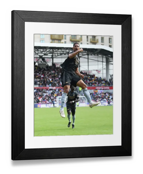 Framed Print : Saliba's Stunner: Arsenal Secure Victory Against Brentford in Exciting Premier League Clash