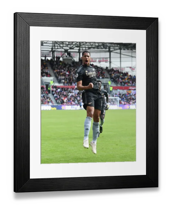 Framed Print : BRENTFORD, ENGLAND - SEPTEMBER 18: William Saliba celebrates scoring Arsenals 1st goal during the Premier League match Framed Print : BRENTFORD, ENGLAND - SEPTEMBER 18: William Saliba celebrates scoring Arsenals 1st goal during the Premier League match