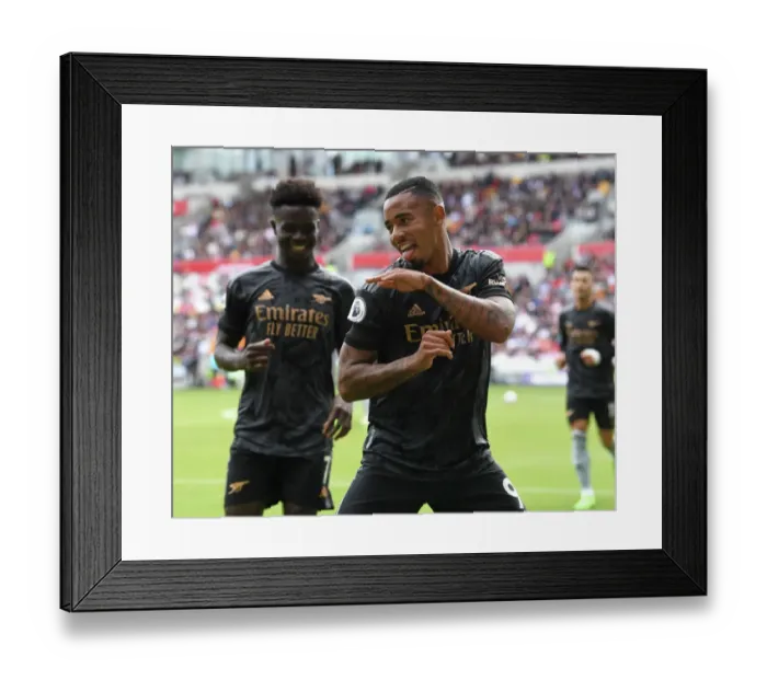 Framed Print : Arsenal's Jesus and Saka Celebrate Winning Goals vs. Brentford