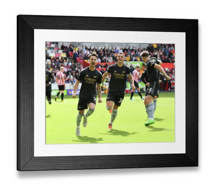 Framed Print : Arsenal's Vieira and Xhaka Celebrate Their Roles in Scoring the Third Goal Against Brentford (2022-23) Framed Print : Arsenal's Vieira and Xhaka Celebrate Their Roles in Scoring the Third Goal Against Brentford (2022-23)