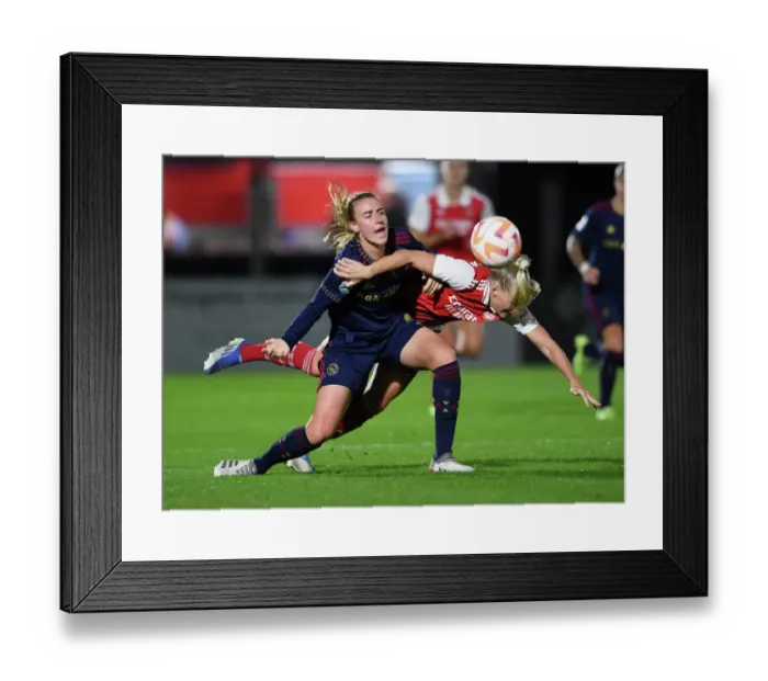 Framed Print : Arsenal vs Ajax: Women's Champions League Clash Marred by Fouls - Stina Blackstenius Targeted Framed Print : Arsenal vs Ajax: Women's Champions League Clash Marred by Fouls - Stina Blackstenius Targeted