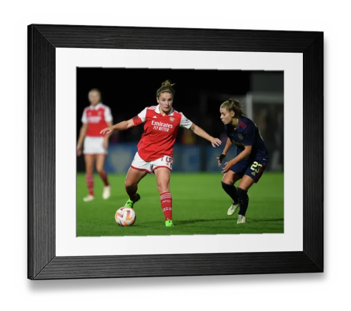 Framed Print : Arsenal vs Ajax: Women's Champions League Showdown - Leah Williamson Faces Off Against Victoria Pelova