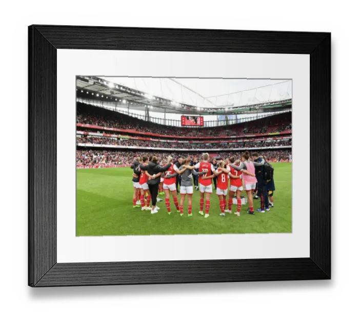 Framed Print : United in Determination: Arsenal and Tottenham Women Post-Match Huddle at Emirates Stadium Framed Print : United in Determination: Arsenal and Tottenham Women Post-Match Huddle at Emirates Stadium